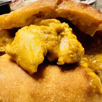 Superkhana International - Butter Chicken Calzone - Indian Near Me - Chicago, Illinois Superkhana International - Butter Chicken Calzone - Indian Near Me - Chicago, Illinois