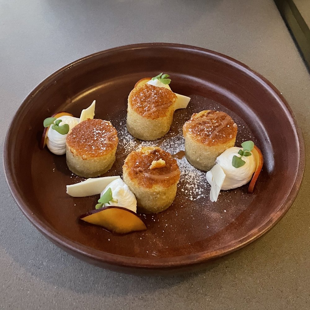 Costa Kitchen & Bar - Olive oil cake with whipped cream and stone fruit - New American Near Me - Santa Barbara, California Costa Kitchen & Bar - Olive oil cake with whipped cream and stone fruit - New American Near Me - Santa Barbara, California
