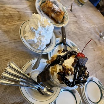 Peter Luger - Luger's Special "Holy Cow" Hot Fudge Sundae Apple Strudel and a mountain of whipped cream! - Steakhouses Near Me - Brooklyn, New York