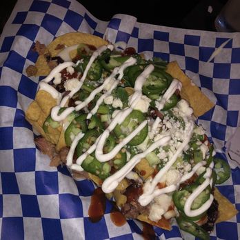 The Blue Pig - Cowboy Brisket Nachos - American Near Me - Cookeville, Tennessee The Blue Pig - Cowboy Brisket Nachos - American Near Me - Cookeville, Tennessee