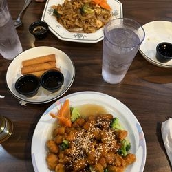 Chopstix - Sesame Chicken with a side of fried rice. Egg noodles with broccoli, onions and egg in a soy sauce