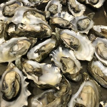 Hog Island Oyster - Getting prepped to be eaten - Seafood Near Me - Marshall, California Hog Island Oyster - Getting prepped to be eaten - Seafood Near Me - Marshall, California