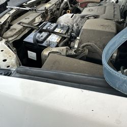 AutoZone - New battery being installed by AutoZone
