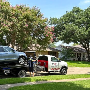 Domar Automotive - Car is loaded and almost ready to transport for repair. - Roadside Assistance Near Me - Plano, Texas