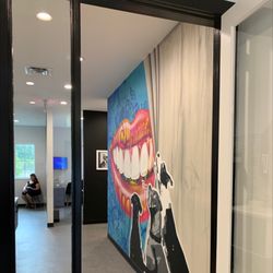 Flossologie - Hallway with mural art