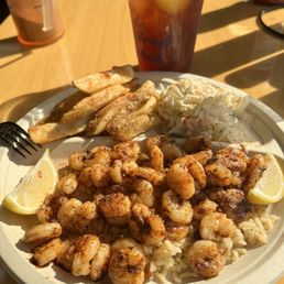 Blackened grilled shrimp, french fries, coleslaw. Blackened grilled shrimp, french fries, coleslaw.