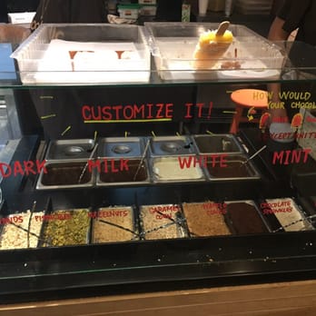 Popbar - Choose from four types of chocolate, then whole or half dip, or drizzle. Then choose toppings. - Desserts Near Me - Anaheim, California Popbar - Choose from four types of chocolate, then whole or half dip, or drizzle. Then choose toppings. - Desserts Near Me - Anaheim, California