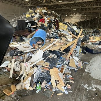 Azevedo Landscaping - a pile of trash in a warehouse - Landscaping Near Me Azevedo Landscaping - a pile of trash in a warehouse - Landscaping Near Me