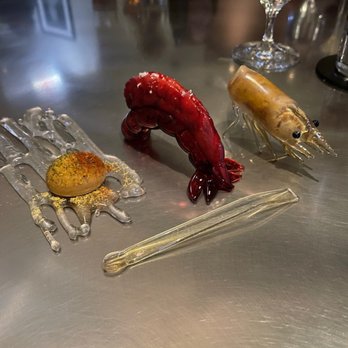 Alinea - Tiny glass spoon! Baguette, prawn, and purée. - New American Near Me - Chicago, Illinois Alinea - Tiny glass spoon! Baguette, prawn, and purée. - New American Near Me - Chicago, Illinois