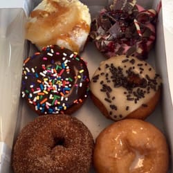 Peace, Love and Little Donuts of Massillon - Cinnamon sugar, glazed, chocolate frosted with sprinkles, maple frosted with sprinkles, apple pie, and raspberry chocolate