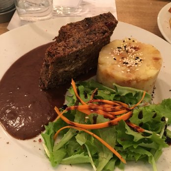 Pastva - lentil-walnut loaf, plum sauce and mashed potatoes with roasted onion - Cafes Near Me - Prague, Puerto Rico Pastva - lentil-walnut loaf, plum sauce and mashed potatoes with roasted onion - Cafes Near Me - Prague, Puerto Rico