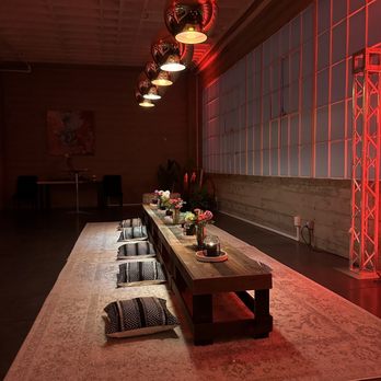 ODETOKYO - a long table in a dimly lit room - Sushi Bars Near Me - San Francisco, California ODETOKYO - a long table in a dimly lit room - Sushi Bars Near Me - San Francisco, California