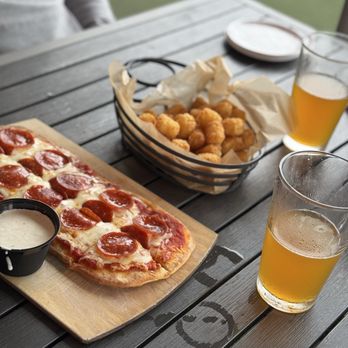 Big Storm Brewery- Clearwater - Ppepperoni flat break , Tater tots and Bromosa. - Breweries Near Me - Clearwater, Florida Big Storm Brewery- Clearwater - Ppepperoni flat break , Tater tots and Bromosa. - Breweries Near Me - Clearwater, Florida