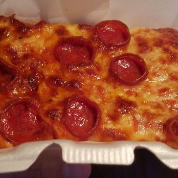 Primos Pizza - If you want to take a vacation in Greece you don't need to actually leave Detroit. This slice is all the grease you will ever need - Pizza Near Me - Allen Park, Michigan