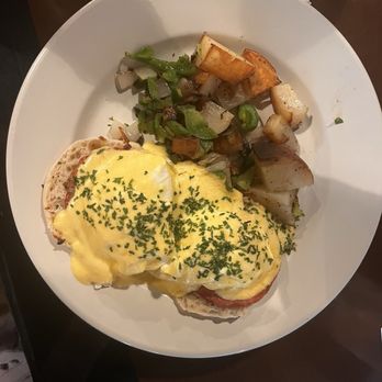 Whiskey Kitchen - Eggs Benedict with side potatoes - Bars Near Me - Mt Dora, Florida