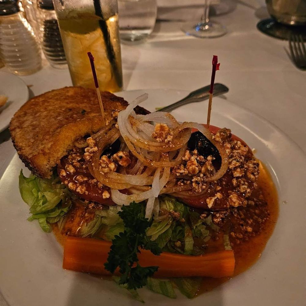 Dal Rae Restaurant - Tomato and Maui onion salad. - Steakhouses Near Me - Pico Rivera, California Dal Rae Restaurant - Tomato and Maui onion salad. - Steakhouses Near Me - Pico Rivera, California