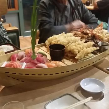 Restaurant Kunio - The Party Boat. It requires at least 4 people to order it, and costs over $31 a person, but it's good to try at least once! - Japanese Near Me - Waipahu, Hawaii Restaurant Kunio - The Party Boat. It requires at least 4 people to order it, and costs over $31 a person, but it's good to try at least once! - Japanese Near Me - Waipahu, Hawaii