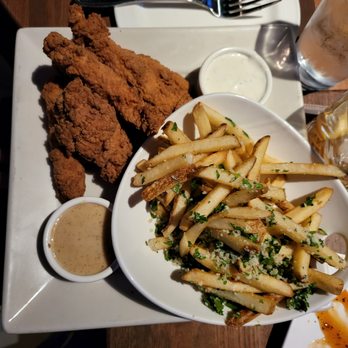 Yard House - Chicken tenders with truffle garlic fries - New American Near Me - Seattle, Washington Yard House - Chicken tenders with truffle garlic fries - New American Near Me - Seattle, Washington