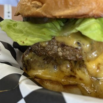 Ultimate Burger - Double decker cheeseburger with lettuce only by request. 7/2024 - Burgers Near Me - Kailua-Kona, Hawaii Ultimate Burger - Double decker cheeseburger with lettuce only by request. 7/2024 - Burgers Near Me - Kailua-Kona, Hawaii