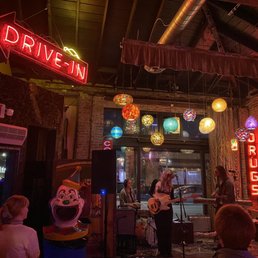 a band playing in a bar a band playing in a bar