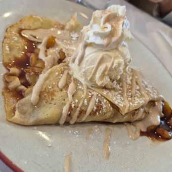 Le Crepe - 2025-04-18. Le Crepe. Royal Oak, MI. Sweet Peach Cobbler crepe. Close up. 4 stars, - Creperies Near Me - Royal Oak, Michigan