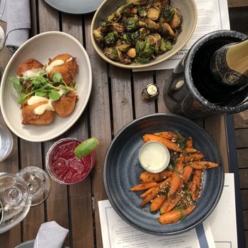 Copper Vine Inn - LA Crawfish Beignets, Cajun Carrots, Brussels Sprouts, CV Signature Margarita - Wine Bars Near Me - New Orleans, Louisiana Copper Vine Inn - LA Crawfish Beignets, Cajun Carrots, Brussels Sprouts, CV Signature Margarita - Wine Bars Near Me - New Orleans, Louisiana