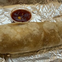 Green chile, egg, potato and cheese breakfast burrito Green chile, egg, potato and cheese breakfast burrito
