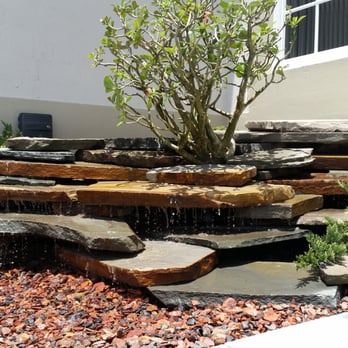 Nerak - a water feature in a garden - Lawn Services Near Me - Miami, Florida Nerak - a water feature in a garden - Lawn Services Near Me - Miami, Florida