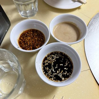 Beijing Hot Pot - Sauces (spicy on left, sesame on right, sweet soy sauce on bottom) - Chinese Near Me - Portland, Oregon Beijing Hot Pot - Sauces (spicy on left, sesame on right, sweet soy sauce on bottom) - Chinese Near Me - Portland, Oregon