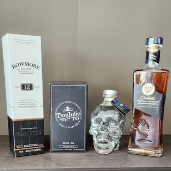 The Liquor Cabinet - a bottle, a box, and a skull head - Beer, Wine & Spirits Near Me - Katy, Texas The Liquor Cabinet - a bottle, a box, and a skull head - Beer, Wine & Spirits Near Me - Katy, Texas
