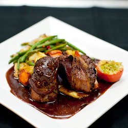 Luigi's Patio Ristorante - Come try one of our delicious entrees, such as the Pork Ribeye, today!