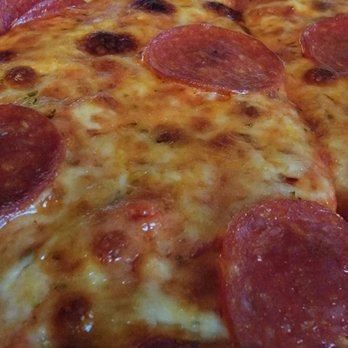 Enzo's Pizzeria - Pepperoni, garlic pizza, pie cut. - Pizza Near Me - Homer Glen, Illinois