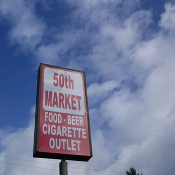 50th Market - a sign for a cigarette outlet - Beer, Wine & Spirits Near Me - Portland, Oregon 50th Market - a sign for a cigarette outlet - Beer, Wine & Spirits Near Me - Portland, Oregon