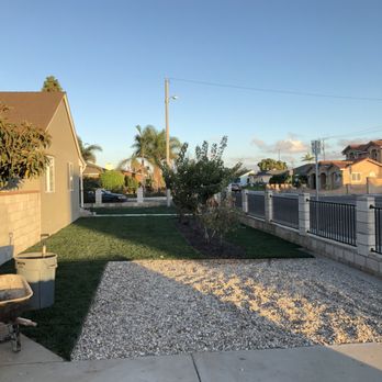 A Torres Landscape - More river rock, bender board and new sod - Landscaping Near Me