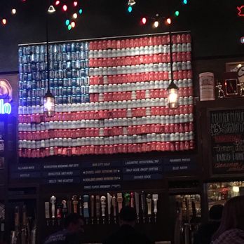 Bub City - Beer can flag over the bar - Bars Near Me - Rosemont, Illinois Bub City - Beer can flag over the bar - Bars Near Me - Rosemont, Illinois