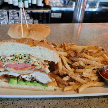 Parker. Eatery & Bar - Crispy chicken sandwich with parmesan fries. - New American Near Me - Shelton, Connecticut Parker. Eatery & Bar - Crispy chicken sandwich with parmesan fries. - New American Near Me - Shelton, Connecticut