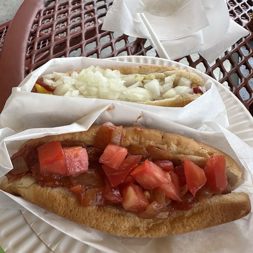 Pacific Coast Hot Dogs - My hotdog with red onions, tomatoes, and ketchup, Frankie's with ketchup, mustard, and onions - Hot Dogs Near Me - Orange, California Pacific Coast Hot Dogs - My hotdog with red onions, tomatoes, and ketchup, Frankie's with ketchup, mustard, and onions - Hot Dogs Near Me - Orange, California