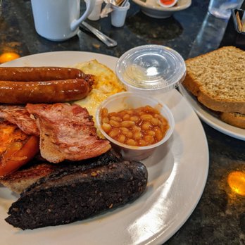 Mad Hatter - 2 eggs, any style, served with Irish bacon, white & black pudding, sausage, grilled tomato, beans & choice of homemade soda bread or toast - Breakfast & Brunch Near Me - Weymouth, Massachusetts Mad Hatter - 2 eggs, any style, served with Irish bacon, white & black pudding, sausage, grilled tomato, beans & choice of homemade soda bread or toast - Breakfast & Brunch Near Me - Weymouth, Massachusetts