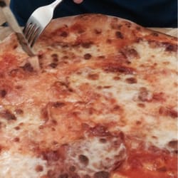 Pizzeria La Ruota - Diavlo (spicy salami) pizza. Pizza are huge and delicious and very well priced! 5-11 euros.