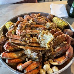 Crab N Go - Build Your Own Boil of Shrimp, Snow Crab, Scallops, Dungeness Crab and Sausage with potatoes and corn.Perfect celebration meal for 3.