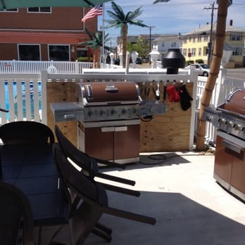 Dolphin Inn - BBQ area for guests - Hotels Near Me - Wildwood, New Jersey Dolphin Inn - BBQ area for guests - Hotels Near Me - Wildwood, New Jersey