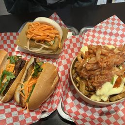 Pork belly banh mi, panko tofu bao, and tofu fries Pork belly banh mi, panko tofu bao, and tofu fries