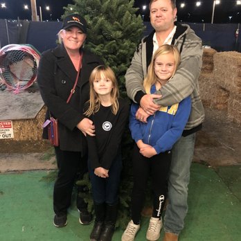Pinery Christmas Trees - The family with our new tree - Christmas Trees Near Me