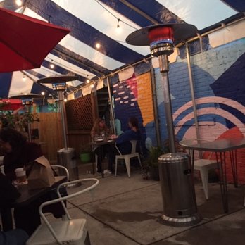 Beard & Belly - The heated tent space. The heaters are those tall lamp-like objects. - Bakeries Near Me - Chicago, Illinois