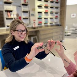 Insight Optometry - A patient is being fitted for glasses by our licensed optician.