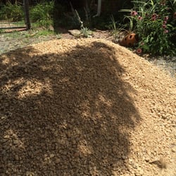Poultry Villa Landscaping And Supplies - About 3.5 cu. yd of medium beige rock for landscaping.