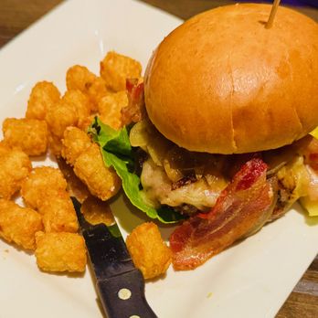 Distill - A Local Bar - Grilled Onion and Applewood Bacon Cheeseburger with Tots - Desserts Near Me - Las Vegas, Nevada Distill - A Local Bar - Grilled Onion and Applewood Bacon Cheeseburger with Tots - Desserts Near Me - Las Vegas, Nevada