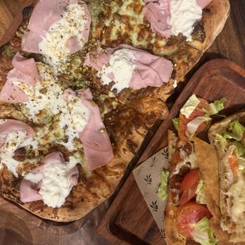 Cotto E Crudo Enoteca - Cotto & Crudo pizza and Pollo Milanese sandwich - Italian Near Me - Houston, Texas Cotto E Crudo Enoteca - Cotto & Crudo pizza and Pollo Milanese sandwich - Italian Near Me - Houston, Texas