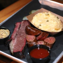 Crooked Ewe - 1/4 lb Texas Smoked Brisket ($5.25), Texas Hot Link ($5.25), Jalapeño Cheddar Grits ($6)