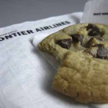 Frontier Airlines - Warm baked on the plane, chocolate chip cookie! - Airlines Near Me - Denver, Colorado Frontier Airlines - Warm baked on the plane, chocolate chip cookie! - Airlines Near Me - Denver, Colorado